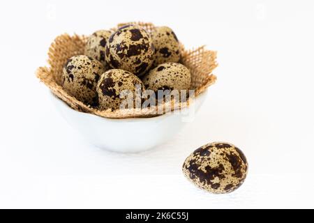 Set of Quail eggs on white background Stock Photo