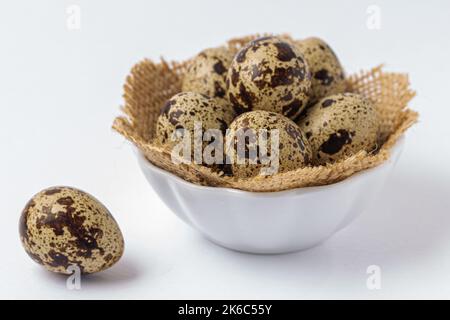 Set of Quail eggs on white background Stock Photo