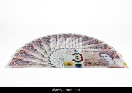 UK money banknotes fan of UK polymer £50 notes fifty pound banknotes british currency Stock Photo