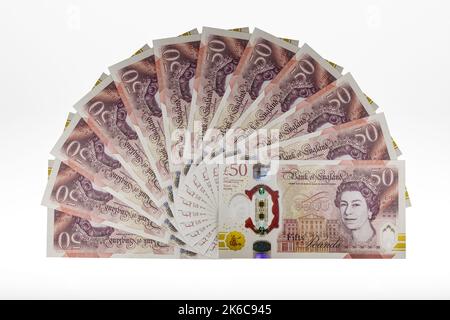 UK money banknotes fan of UK polymer £50 notes fifty pound banknotes british currency Stock Photo