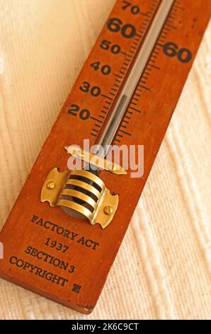 Wooden industrial bulb thermometer, showing cold temperature in Fahrenheit - factory act 1937 Section 3 copyright, Stock Photo