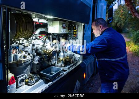 Schwerin, Germany. 10th Oct, 2022. Günter M. delivers heating oil to private households with his tanker truck from the Kopsicker company. With rising energy prices, the cost of heating oil has also increased significantly. Credit: Jens Büttner/dpa/Alamy Live News Stock Photo