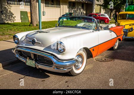 Falcon Heights, MN - June 19, 2022: High perspective front corner view of a 1956 Oldsmobile Super 88 Convertible at a local car show. Stock Photo