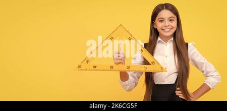 angle degree measurement. trigonometry stationery. measuring and sizing. Horizontal isolated poster of school girl student. Banner header portrait of Stock Photo