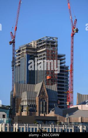 Telephoto shot of a London Skyscraper being constructed in the financial district with One Minister Court in the foreground. Stock Photo