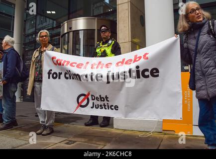 London, England, UK. 13th Oct, 2022. Protesters gathered outside the World Bank's London office demanding that IMF and World Bank cancel the debts of the Global South for climate justice. (Credit Image: © Vuk Valcic/ZUMA Press Wire) Stock Photo