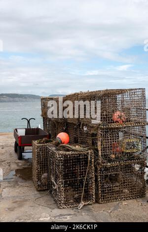 lobster crab pots traps on The Cobb at Lyme Regis Dorset England Stock Photo