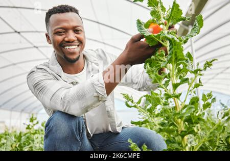 Would you look at that. a handsome young man working on his farm. Stock Photo