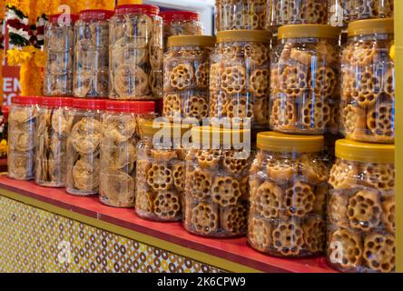 Close-up view of the honeycomb cookies and crispy peanut crackers selling at the booth. Stock Photo