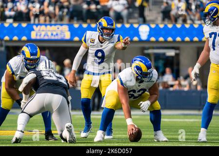 Quarterback (9) Matthew Stafford of the Los Angeles Rams passes the ball  against the Arizona Cardinals in an NFL football game, Monday, Dec. 13,  2021, in Glendale, AZ. The Rams defeated the