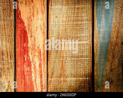 texture of old deteriorated and colorfully painted boards Stock Photo