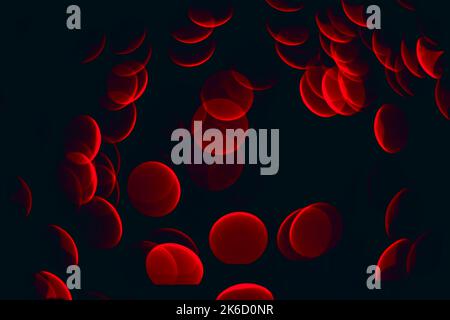 close up of red spheres floating on a dark background Stock Photo