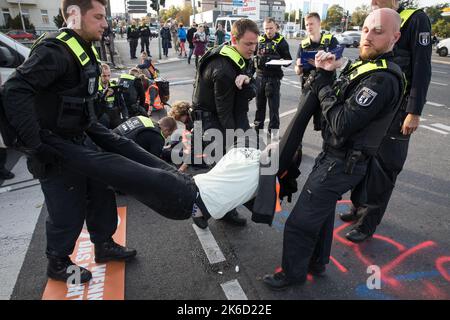 Berlin, Germany. 13th Oct, 2022. On October 13, 2022 climate activists again blocked freeway exits in Berlin. The climate activists are from the group Last Generation. They are demanding a speed limit on German freeways, as well as train rides that everyone can afford. (Credit Image: © Michael Kuenne/PRESSCOV via ZUMA Press Wire) Stock Photo