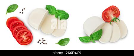 Mozzarella cheese sliced with basil leaf and tomato isolated on white background. Top view. Flat lay Stock Photo