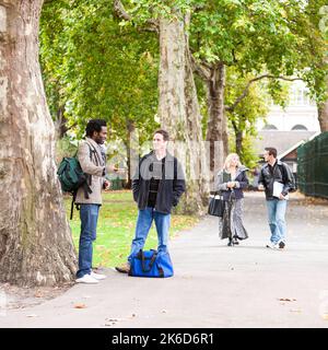 Adult Education: Discussing Class. Mature students during a break from class. From a series of related images on the subject. Stock Photo