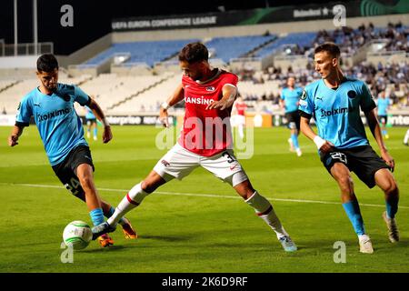 LIMASSOL - (lr) Amine Khammas of Apollon Limassol FC, Pantelis Hatzidiakos of AZ, Danilo Spoljaric of Apollon Limassol FC during the UEFA Conference League Group E match between Apollon Limassol FC and AZ at Tsirion Stadium on October 13, 2022 in Limassol, Cyprus. ANP ED OF THE POL Stock Photo