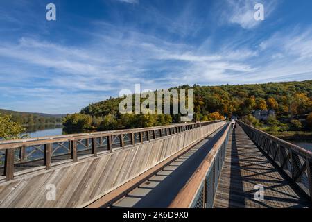 Historic Roebling Bridge also known as Roebling's Delaware Aqueduct over the Delaware River on a brilliant fall morning Stock Photo