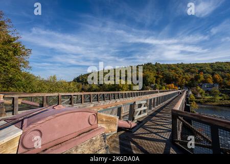 Historic Roebling Bridge also known as Roebling's Delaware Aqueduct over the Delaware River on a brilliant fall morning Stock Photo