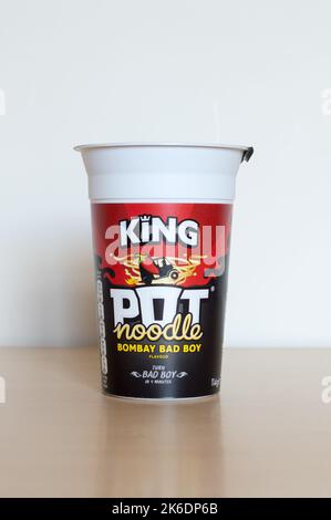 Pot noodle isolated on table Stock Photo