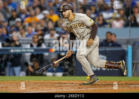 San Diego Padres center fielder Trent Grisham (2) runs to first base after a bunt during the NLDS Game 2 against the Los Angeles Dodgers, Wednesday, O Stock Photo