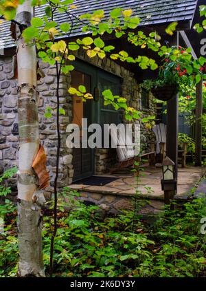 The West Dorm Entrance is surrounded by early autumn foliage, The Clearing, Door County, Wisconsin Stock Photo