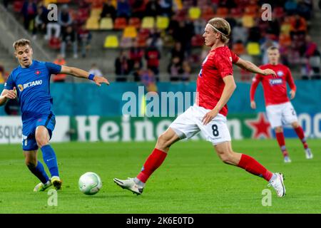 Bucharest, Romania. 13th Oct, 2022. October 13, 2022: Stefan Teitur Thordarson #8 of Silkeborg IF during of the UEFA Europa Conference League group B match between FCSB Bucharest and Silkeborg IF at National Arena Stadium in Bucharest, Romania ROU. Catalin Soare/Cronos Credit: Cronos/Alamy Live News Stock Photo