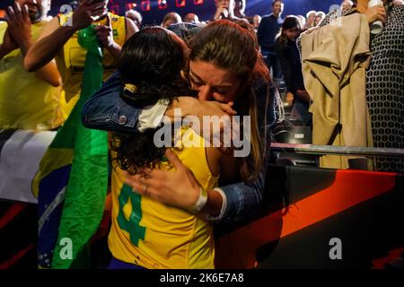 APELDOORN, NETHERLANDS - OCTOBER 13: Ana Carolina Da Silva of Brazil is congratulated by her girlfriend Anne Buijs of the Netherlands during the Semi Final match between Italy and Brazil on Day 19 of the FIVB Volleyball Womens World Championship 2022 at the Omnisport Apeldoorn on October 13, 2022 in Apeldoorn, Netherlands (Photo by Rene Nijhuis/Orange Pictures) Stock Photo