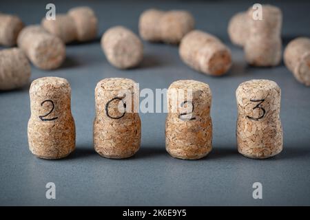 Wine corks with the number 2020 pushed ahead of other corks. Upcoming new year Stock Photo
