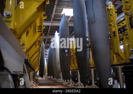 External aircraft fuel tanks are arranged on the vertical tank storage system in an 18th Component Maintenance Squadron fuels building at Kadena Air Base, Japan, Sept. 16, 2022. Each external aircraft fuel tank is held in a numbered section of the VTSS, allowing for easy logging and identification of tanks for maintenance and inspection purposes. (U.S. Air Force photo by Senior Airman Jessi Roth) Stock Photo