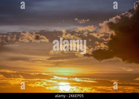 Sunrise dramatic sky with clouds in a row, colorful cloudscape Stock Photo