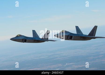 Lask, Poland. 12th Oct, 2022. U.S. Air Force F-22 Raptor fighter aircraft assigned to the 90th Expeditionary Fighter Squadron conduct a two-ship formation during the NATO Air Shielding over Poland October 12, 2022 near Lask, Poland. Credit: SSgt Danielle Sukhlall/U.S Air Force/Alamy Live News Stock Photo
