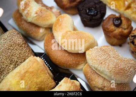 Picture of a Lot of Sweet Croissants and Some Dessert in Supermarket Bakery Stock Photo