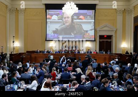 The U.S. House Select Committee to Investigate the January 6 Attack on the U.S. Capitol plays a video of former U.S. President Donald Trump's former White House political advisor Steve Bannon during their public hearing on Capitol Hill in Washington, DC, USA, October 13, 2022. The committee voted Thursday to subpoena Trump for documents and testimony, marking an escalation in the panel’s efforts to obtain testimony from the former President. The committee’s leaders argued that Trump was at the center of efforts to overturn the 2020 election that led to the violence of the insurrection, and as Stock Photo
