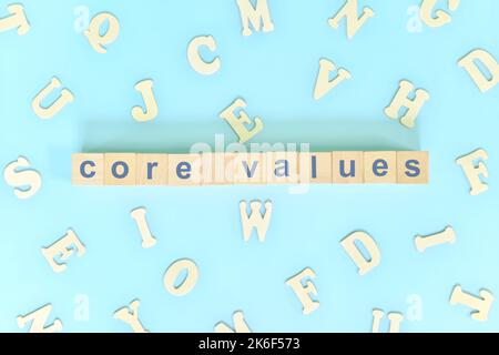Core values concept in business, company and organization. Word typography on wooden blocks flat lay. Stock Photo
