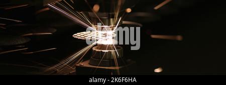 Mechanical cutting of sheet metal on CNC laser cutting machine Stock Photo