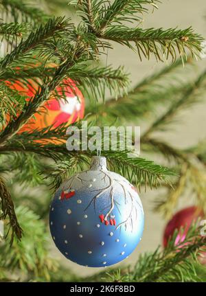 Beautiful Christmas tree and festive decor in bedroom. Interior design ...