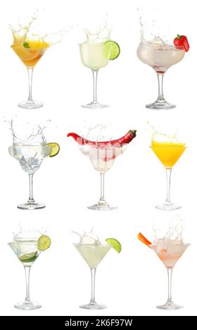 Set of tasty martini cocktails with splashes isolated on white Stock Photo