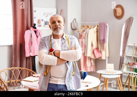 Mature fashion designer in studio Stock Photo
