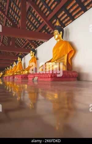 Buddha images are arranged in Wat Phra Mahathat Woramahawihan, Nakhon Si Thammarat, Thailand. Stock Photo