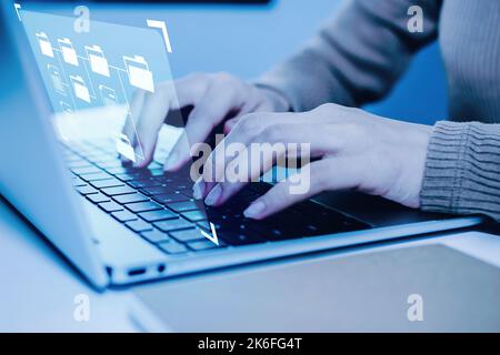 Document management system. people hand using laptop computer with virtual graphic icon on desk at home office, digital marketing, work from home, bus Stock Photo