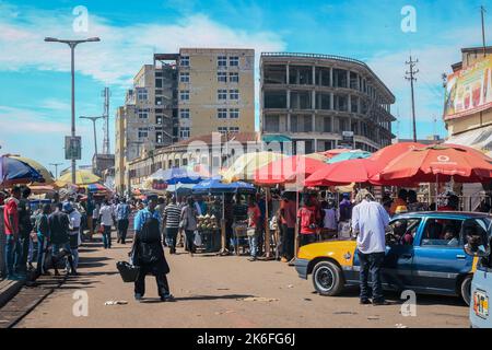 Kumasi, Ghana - April 04, 2022: Busy Street near the Ghana Central Market in Kumasi Stock Photo