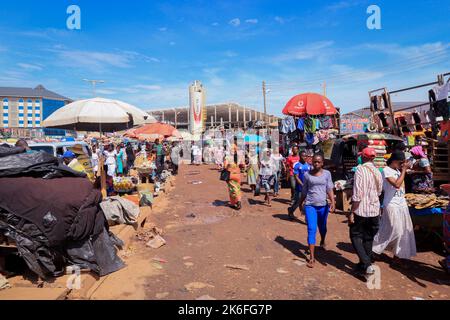 Kumasi, Ghana - April 04, 2022: Busy Street near the Ghana Central Market in Kumasi Stock Photo