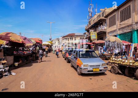 Kumasi, Ghana - April 04, 2022: Busy Street near the Ghana Central Market in Kumasi Stock Photo