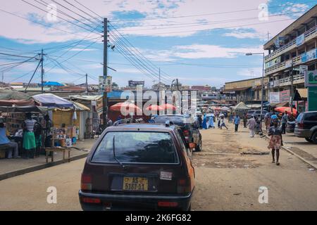 Kumasi, Ghana - April 04, 2022: Busy Street near the Ghana Central Market in Kumasi Stock Photo