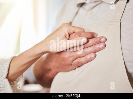 Hands, elderly care and support for love in hope, trust and faith or gratitude for caring relationship. Closeup of hand holding of senior couple in Stock Photo