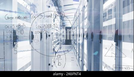 Image of mathematical equations and data processing over server room Stock Photo