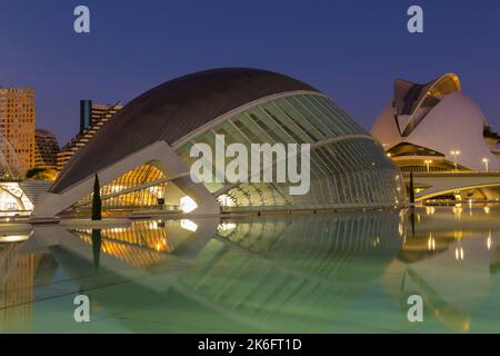 Hemisfèric,a digital 3D cinema & planetarium with Palau de les Arts Reina Sofía behind at City of Arts and Sciences in Valencia Spain at dawn in Sept Stock Photo