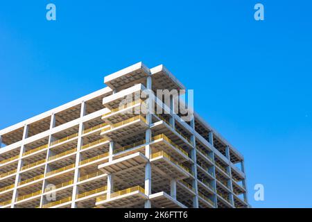 Unfinished or abandoned construction. Mortgage or economic crisis in construction industry concept photo. Strike of the workers concept. Stock Photo