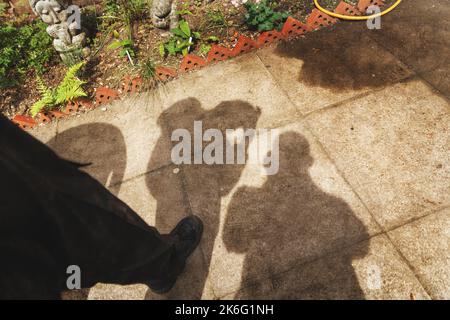 Shadows of people on ground