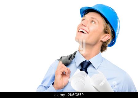 Never look down on your goals. a handsome young contractor standing alone in the studio and looking contemplative while holding blueprints. Stock Photo